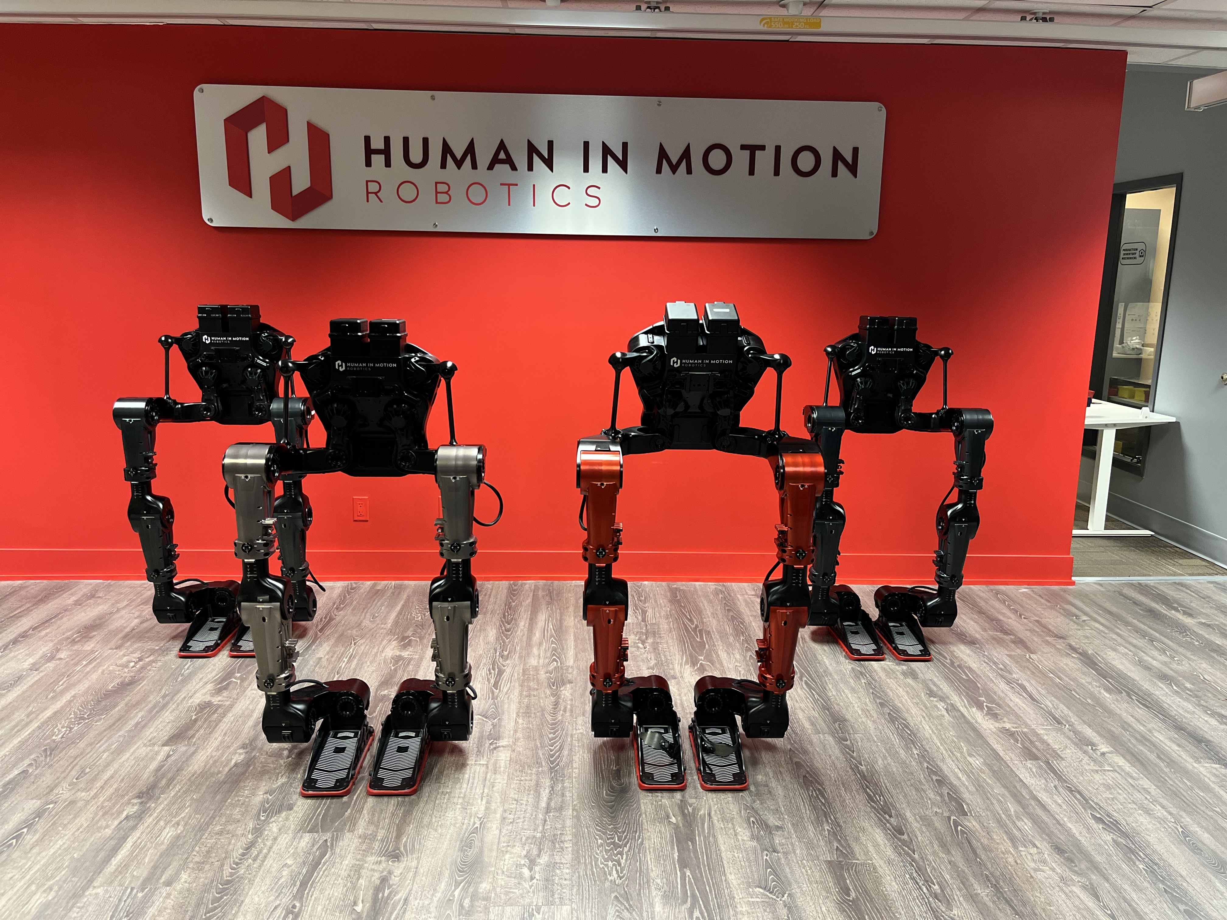 Four Human in Motion Robotics lower-limb exoskeleton platforms in the development lab